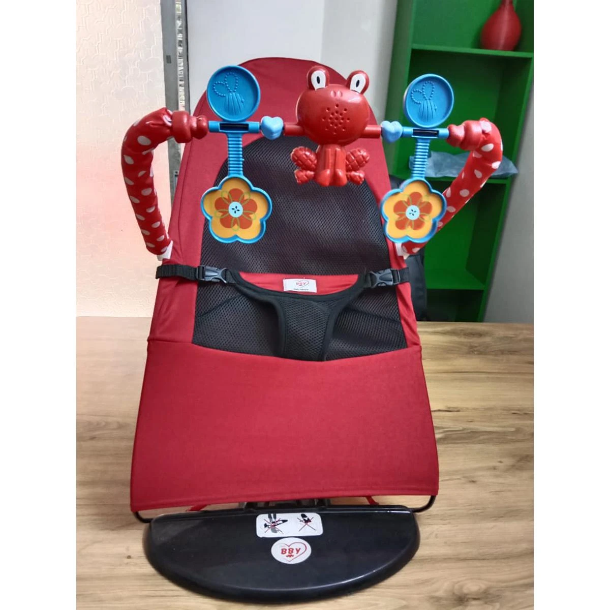 Baby bouncer chair with toy